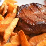 steak and fries cocked using the air fryer