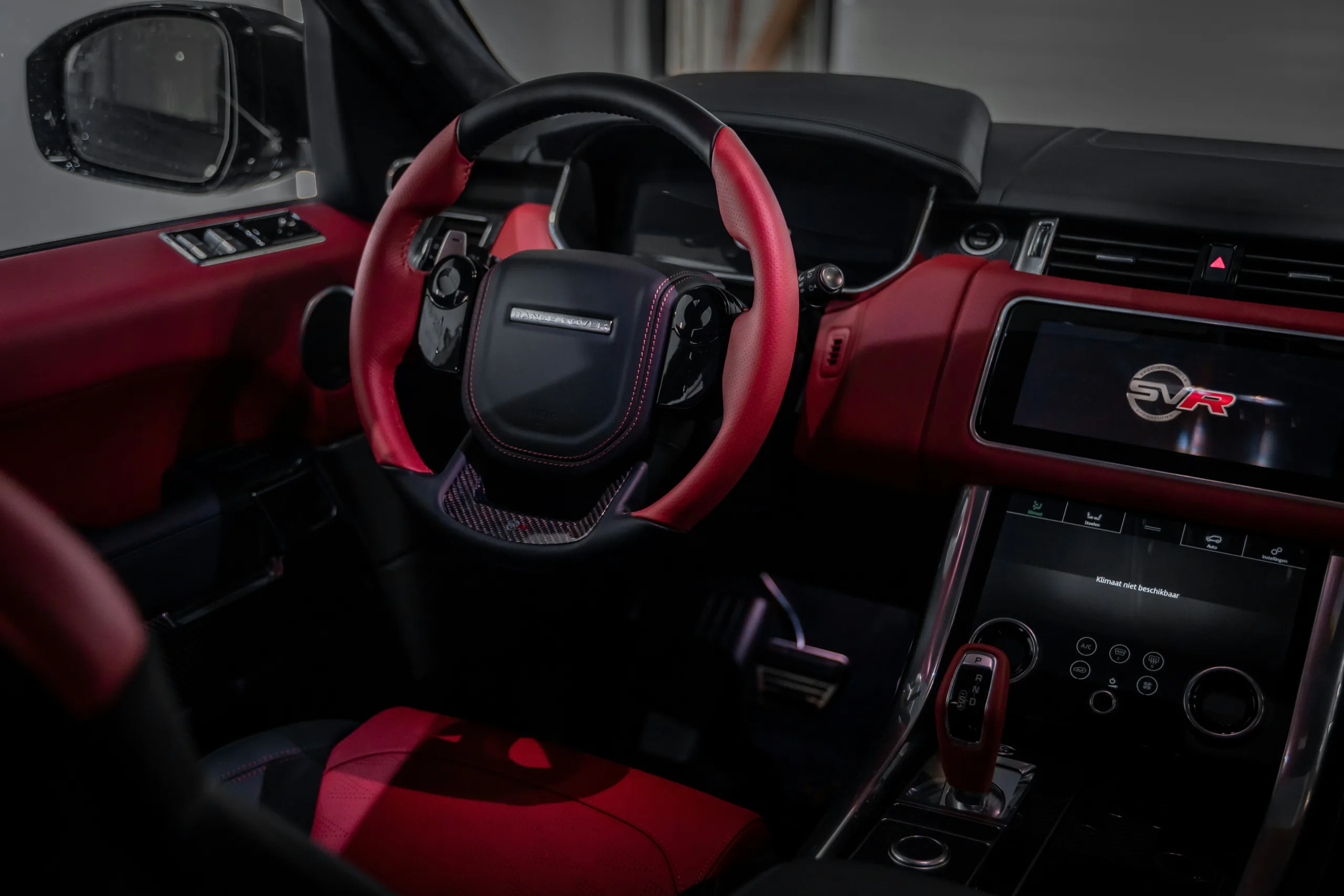 Red and black Car interior featuring SINGARO Car Cup Coaster